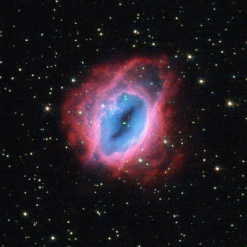 It may look like something from The Lord of the Rings, but this fiery swirl  is actually a planetary nebula known as ESO 456-67. Set against a  backdrop of bright stars, the rust-coloured object lies in the  constellation of Sagittarius (The Archer), in the southern sky. Despite  the name, these ethereal objects have nothing at all to do with  planets; this misnomer came about over a century ago, when the first  astronomers to observe them only had small, poor-quality telescopes.  Through these, the nebulae looked small, compact, and planet-like  and  so were labelled as such. When  a star like the Sun approaches the end of its life, it flings material  out into space. Planetary nebulae are the intricate, glowing shells of  dust and gas pushed outwards from such a star. At their centres lie the  remnants of the original stars themselves  small, dense white dwarf  stars. In  this image of ESO 456-67, it is possible to see the various layers of  material expelled by the central star. Each appears in a different hue   red, orange, yellow, and green-tinted bands  of gas are visible, with clear patches of space at the heart of the  nebula. It is not fully understood how planetary nebulae form such a  wide variety of shapes and structures; some appear to be spherical, some  elliptical, others shoot material in waves from their polar regions,  some look like hourglasses or figures of eight, and others resemble  large, messy stellar explosions  to name but a few. A version of this image was entered into the Hubble's Hidden Treasures image processing competition by contestant Jean-Christophe Lambry